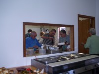 Serving food at Fall Supper Serving food at Fall Supper