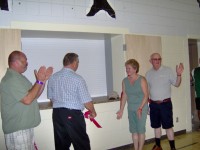 Brian & Gladys Jesse cuting Ribbon