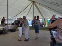 Dancing to the music by local musicians
